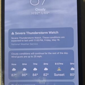 Smartphone with Weather App Display